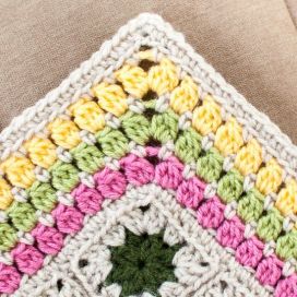 A colourful hem finishes off a granny square throw perfectly. Found Here.