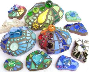 Perfect addition to your fairy garden...glue gems and mosaic glass to pebbles or self drying clay. Image found Here.